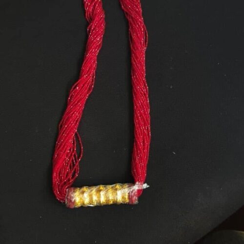 9f0dbb58-882d-44df-98ca-3cc1b3b6af7d red-pote-necklace